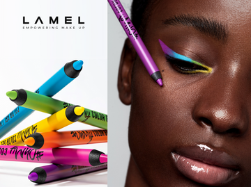 Girl with bright colored arrows on her eyelids.