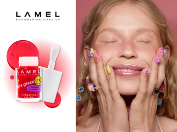 Girl with pink eyeliner, mascara, and gloss to create a strawberry look.